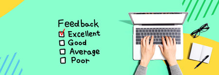 Feedback with person using a laptopの写真素材
