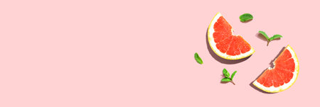 Fresh grapefruits and mints overhead viewの写真素材