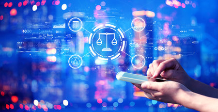Legal advice service concept with person using a smartphone at nightの写真素材