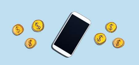 Blank smartphone with coins - earn online themeの写真素材