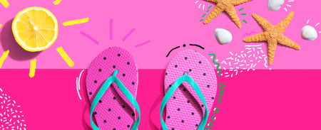 Summer concept with flip flops and lemon sunlightの写真素材