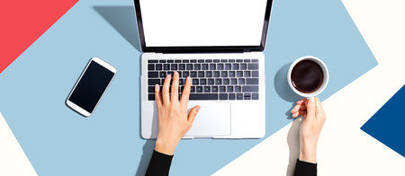 Person using a laptop computerの写真素材