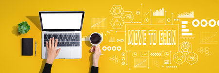 Move to Earn theme with person using laptop computerの写真素材