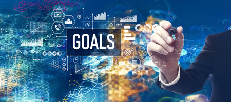 Goal theme with businessman in a bokeh neon light trails city backgroundの写真素材