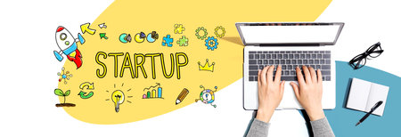 Startup with person using a laptopの写真素材