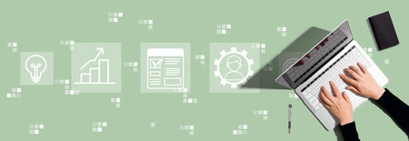 Project management theme with person using laptop computerの写真素材