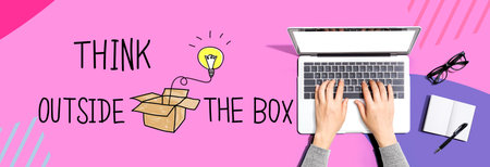 Think outside the box with person using a laptopの写真素材