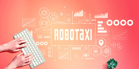 Robotaxi theme with person using computer keyboardの写真素材