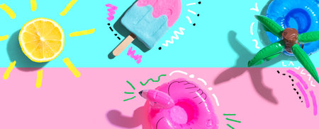 Summer concept with a flamingo float, lemon sunlight and an ice creamの写真素材