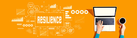 Resilience theme with person using a laptopの写真素材