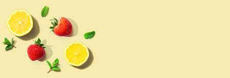 Fresh lemons and strawberries with mintsの写真素材