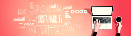 Sustainability theme with person using a laptopの写真素材