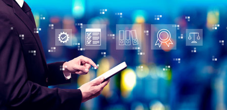 Compliance theme with businessman using a tablet computerの写真素材