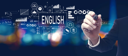 Learning English concept with businessman at nightの写真素材