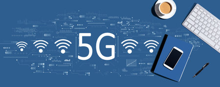 5G network with computer keyboard and office itemsの写真素材