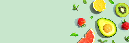 Avocado and mixed fruits overhead viewの写真素材