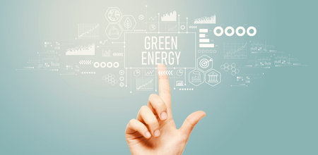 Green Energy concept with hand pressing a buttonの写真素材