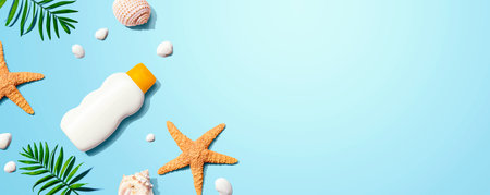 Sunblock bottle with starfish and seashellsの写真素材