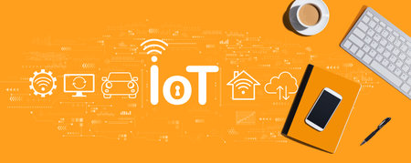 IoT theme with computer keyboard and office itemsの写真素材