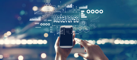 Metaverse theme with person using smartphoneの写真素材