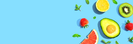 Avocado and mixed fruits overhead viewの写真素材