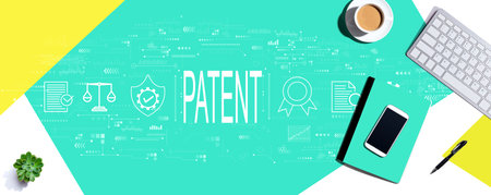 Patent concept with computer keyboard and office itemsの写真素材