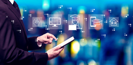Distance learning theme with businessman using a tablet computerの写真素材