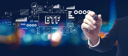 ETF theme with businessman at nightの写真素材