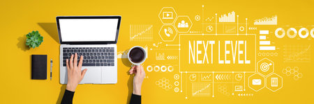 Next level concept with person using laptop computerの写真素材