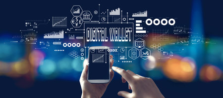 Digital Wallet theme with person using a smartphone at nightの写真素材