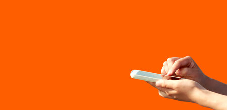 Person using a smartphoneの写真素材