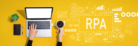 Robotic Process Automation theme with person using laptop computerの写真素材