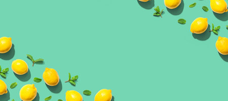Fresh yellow lemons with mints overhead viewの写真素材