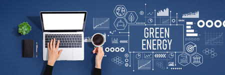 Green Energy concept with person using laptop computerの写真素材