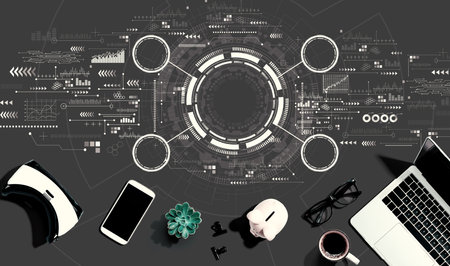 Tech circle with electronic gadgets and office suppliesの写真素材