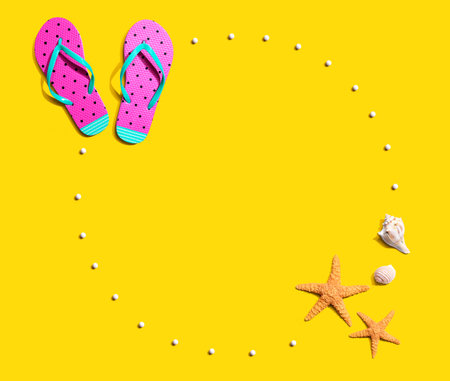 Summer concept with flip flops and starfishの写真素材
