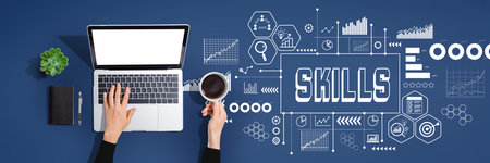 Skills theme with person using laptop computerの写真素材