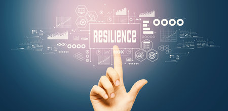 Resilience theme with hand pressing a buttonの写真素材
