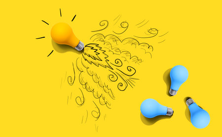 One unique Idea light bulb flying to the sky like a rocketの写真素材