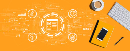 Project management theme with computer keyboard and office itemsの写真素材