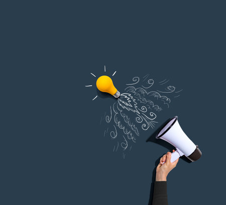Attention and announcement concept with an idea light bulb flying to the sky like a rocketの写真素材
