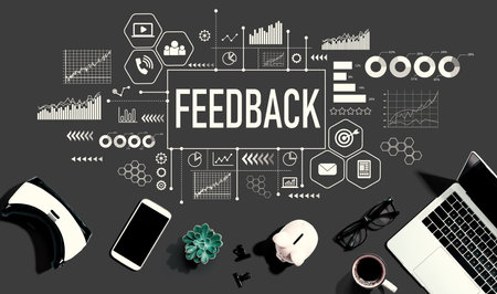 Feedback theme with electronic gadgets and office suppliesの写真素材