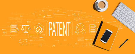 Patent concept with computer keyboard and office itemsの写真素材