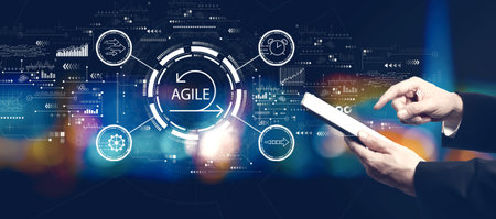 Agile concept with businessman using a tablet computerの写真素材