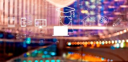 Distance learning theme with big city at nightの写真素材