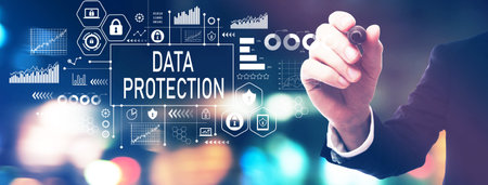 Data protection theme with a businessman holding a markerの写真素材