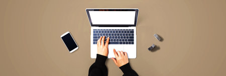 Person using a laptop computerの写真素材