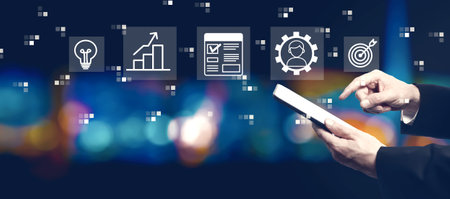 Project management theme with businessman using a tablet computerの写真素材