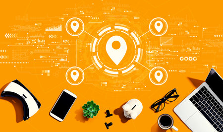 Map pin concept with electronic gadgets and office suppliesの写真素材