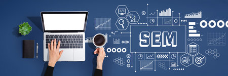 SEM with person using laptop computerの写真素材